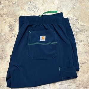 Carhartt Navy Blue scrub bottoms with Green Accents